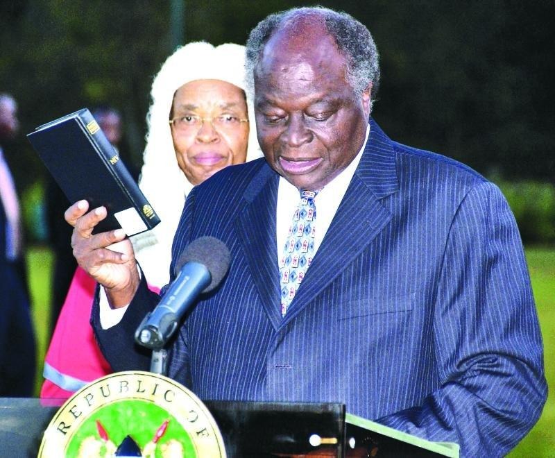 President Mwai Kibaki being sworn in after the disputed 2007 election